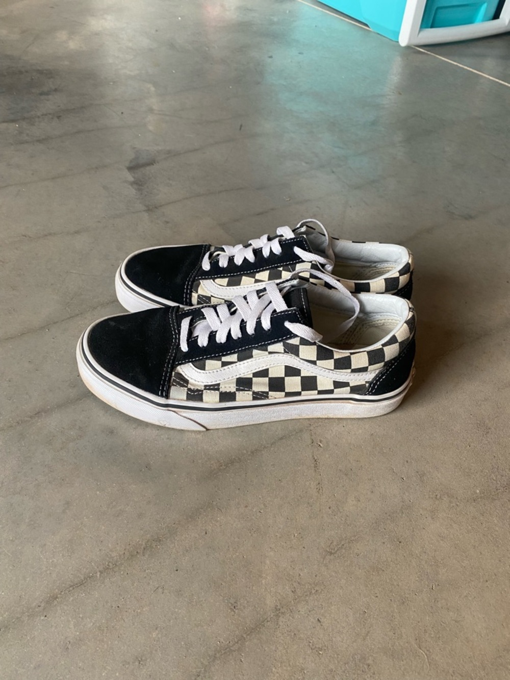 Woman’s checkered lace up vans